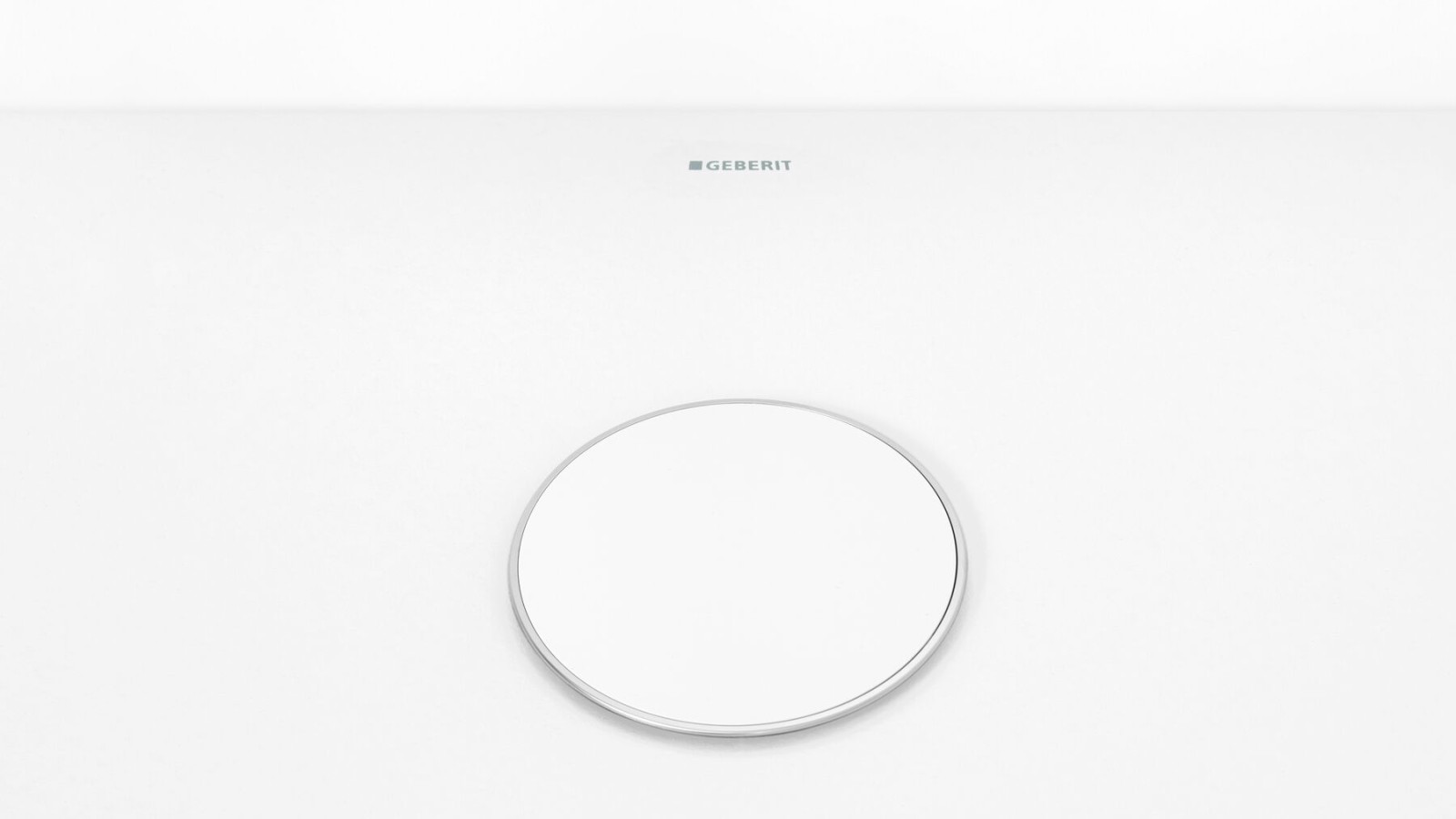 Afvoerkap in wit met discrete chroome rand Afvoerkap in wit met discrete chroome rand