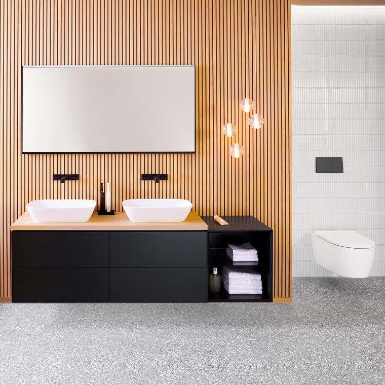 Twee opzetwastafel met een wastafelblad en onderkast Twee opzetwastafel met een wastafelblad en onderkast