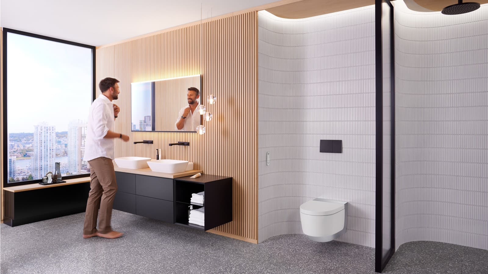 Man in badkamer voor spiegel Geberit Option Plus Square en zwart Geberit ONE badkamermeubel (© Geberit) Man in badkamer voor spiegel Geberit Option Plus Square en zwart Geberit ONE badkamermeubel (© Geberit)