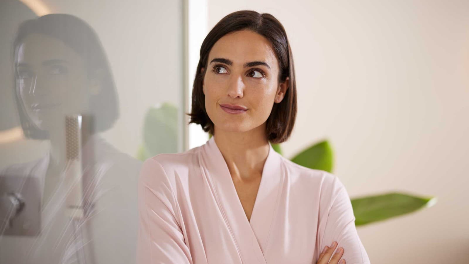 Vrouw in de badkamer Vrouw in de badkamer
